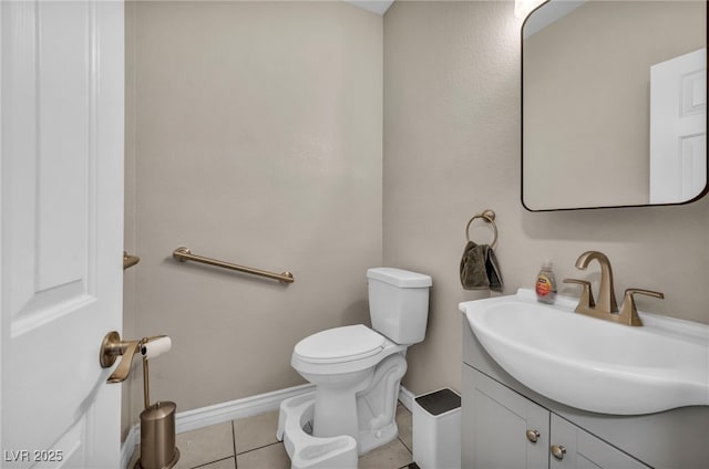 90 Ancient Hills Ln, Henderson, NV 89074 - half bath featuring vanity, toilet, tile patterned flooring, and baseboards