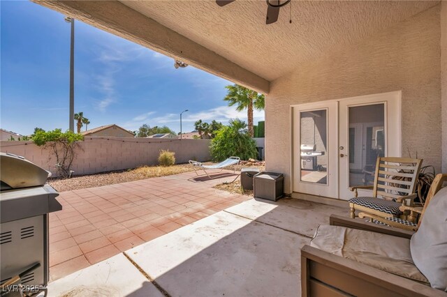 90 Ancient Hills Ln, Henderson, NV 89074 - view of patio with a fenced backyard, area for grilling, and ceiling fan