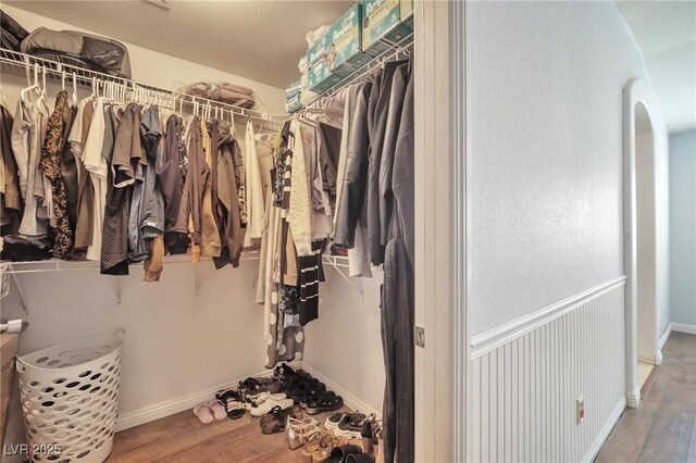 9383 Borough Park St, Las Vegas, NV 89178 - spacious closet with arched walkways and wood finished floors