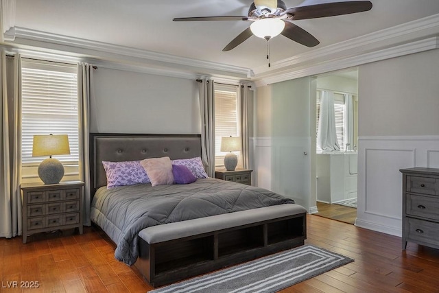 580 Via Di Parione Ct, Henderson, NV 89011 - bedroom featuring hardwood / wood-style flooring, ceiling fan, ornamental molding, and a wainscoted wall