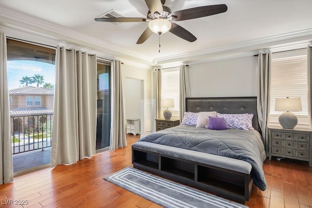 580 Via Di Parione Ct, Henderson, NV 89011 - bedroom featuring ceiling fan, visible vents, crown molding, wood finished floors, and access to exterior