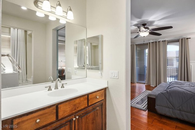 580 Via Di Parione Ct, Henderson, NV 89011 - bathroom with vanity, a ceiling fan, and wood finished floors