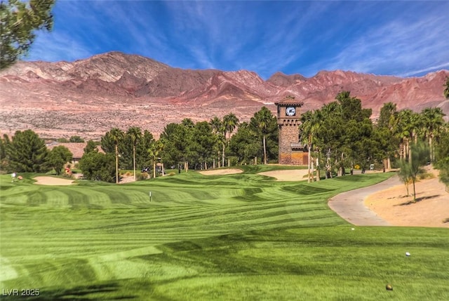 580 Via Di Parione Ct, Henderson, NV 89011 - view of community with a lawn, golf course view, and a mountain view
