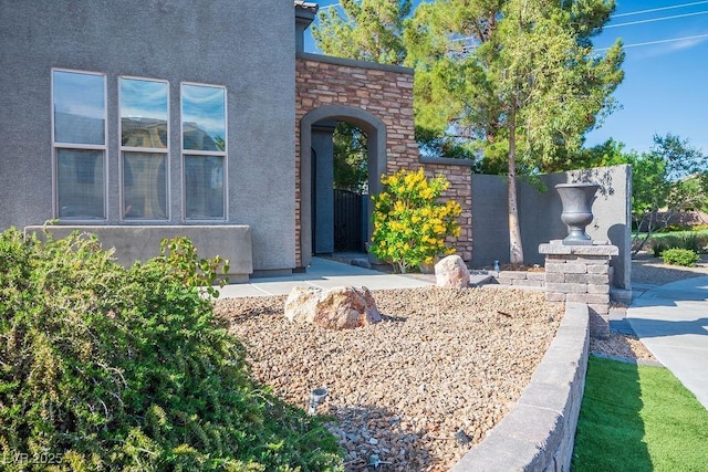 580 Via Di Parione Ct, Henderson, NV 89011 - view of exterior entry with stone siding and stucco siding