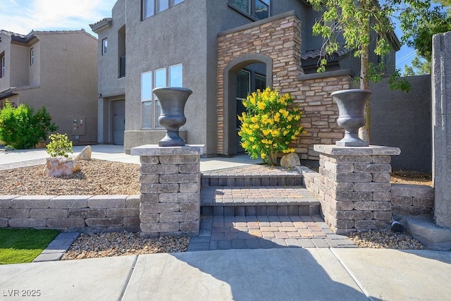 580 Via Di Parione Ct, Henderson, NV 89011 - entrance to property with stone siding and stucco siding