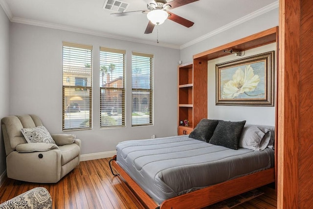 580 Via Di Parione Ct, Henderson, NV 89011 - bedroom with wood-type flooring, crown molding, visible vents, baseboards, and ceiling fan