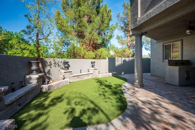 580 Via Di Parione Ct, Henderson, NV 89011 - view of yard with a fenced backyard and a patio area