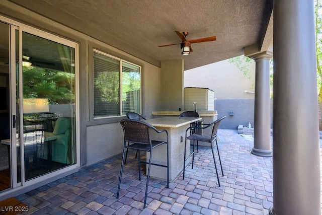 580 Via Di Parione Ct, Henderson, NV 89011 - view of patio with outdoor dry bar and ceiling fan