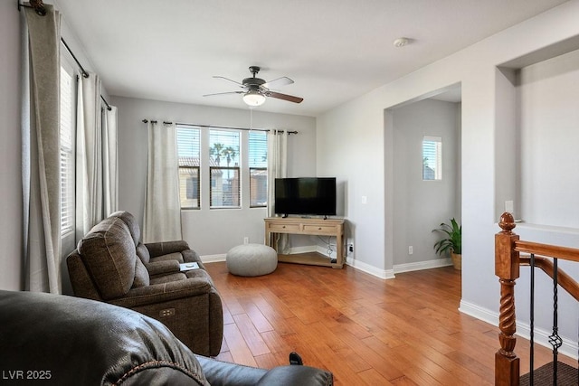 580 Via Di Parione Ct, Henderson, NV 89011 - living area featuring light wood-type flooring, baseboards, and ceiling fan