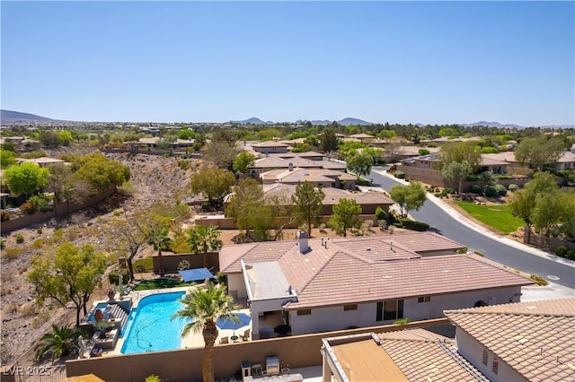 aerial view featuring a mountain view and a residential view
