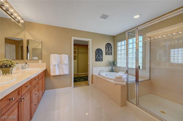 full bath with visible vents, a bath, a healthy amount of sunlight, tile patterned floors, and a stall shower