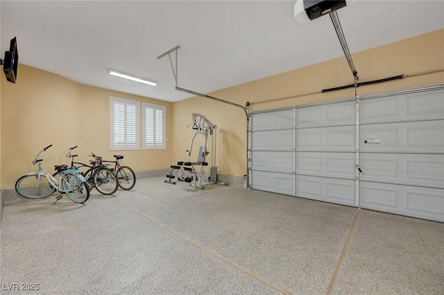 garage featuring a garage door opener