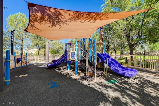 community play area featuring fence