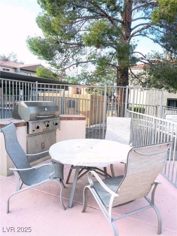 3151 Soaring Gulls Dr Unit 2035, Las Vegas, NV 89128 - view of patio featuring outdoor dining space and grilling area