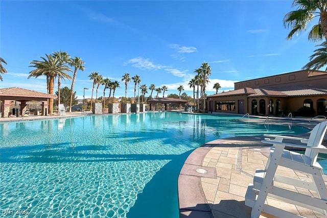1045 Via Camelia St, Henderson, NV 89011 - community pool with a patio area and a gazebo