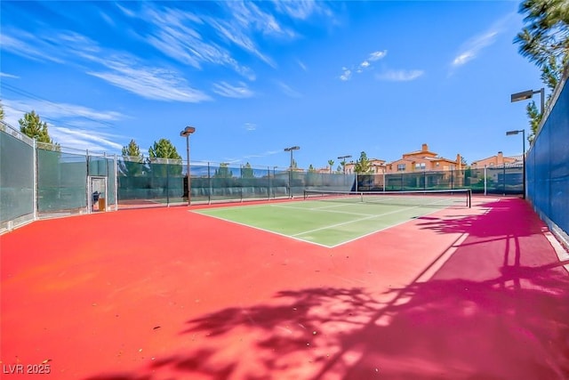 1045 Via Camelia St, Henderson, NV 89011 - view of sport court with fence
