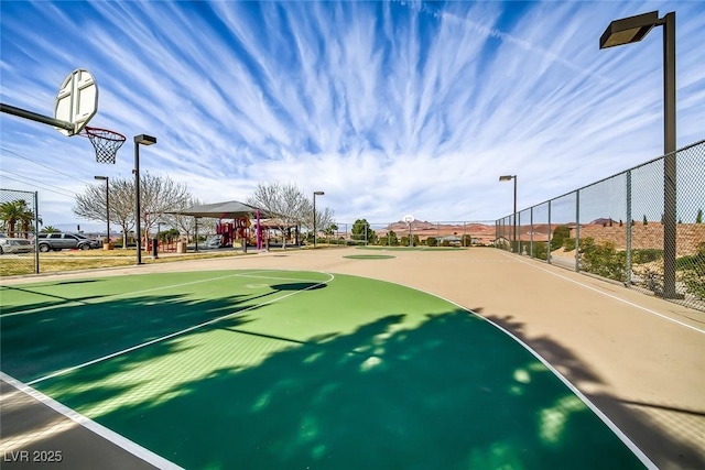 1045 Via Camelia St, Henderson, NV 89011 - view of basketball court featuring community basketball court, a gazebo, and fence