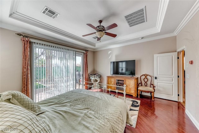 1045 Via Camelia St, Henderson, NV 89011 - bedroom featuring a raised ceiling, access to outside, and visible vents