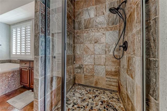 1045 Via Camelia St, Henderson, NV 89011 - bathroom with a shower stall and a garden tub