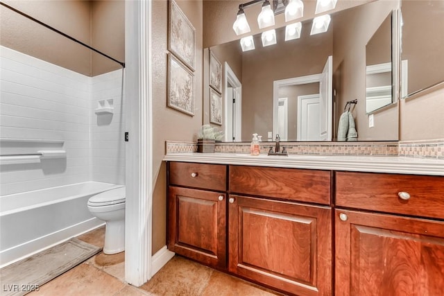 1045 Via Camelia St, Henderson, NV 89011 - full bathroom featuring toilet, tile patterned flooring, shower / washtub combination, and vanity
