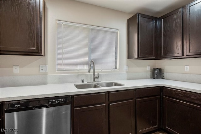 kitchen featuring light countertops, stainless steel dishwasher, a sink, and dark brown cabinets