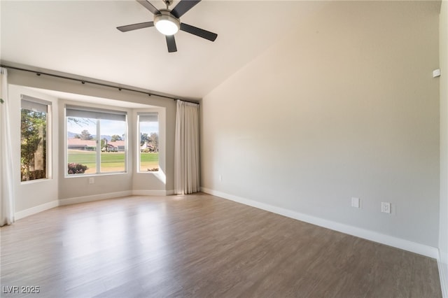 2725 Showcase Dr, Las Vegas, NV 89134 - empty room featuring baseboards, a ceiling fan, wood finished floors, and lofted ceiling