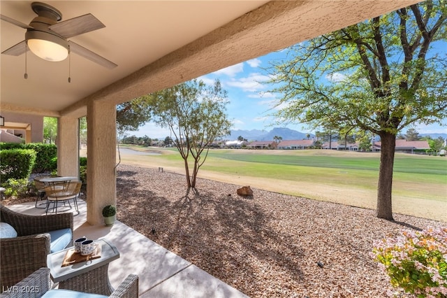 2725 Showcase Dr, Las Vegas, NV 89134 - view of patio with golf course view and ceiling fan
