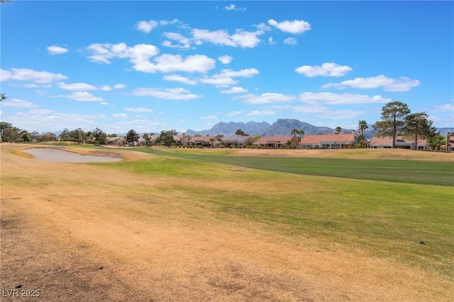 2725 Showcase Dr, Las Vegas, NV 89134 - view of community featuring view of golf course, a yard, a residential view, and a mountain view