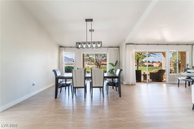 2725 Showcase Dr, Las Vegas, NV 89134 - dining room featuring light wood-style floors and baseboards