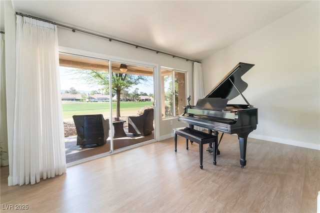 2725 Showcase Dr, Las Vegas, NV 89134 - sitting room featuring baseboards and wood finished floors