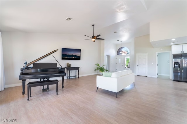 2725 Showcase Dr, Las Vegas, NV 89134 - living area featuring light wood-type flooring, ceiling fan, baseboards, and visible vents