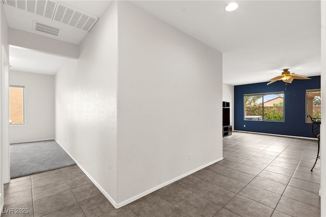 3528 Tack St, Las Vegas, NV 89122 - hall with tile patterned floors, baseboards, and recessed lighting
