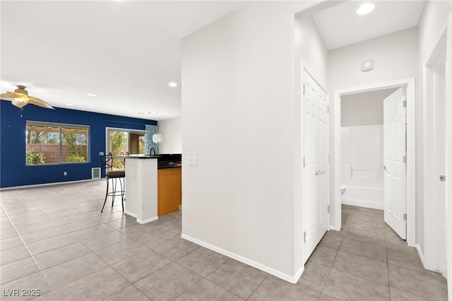 3528 Tack St, Las Vegas, NV 89122 - hall featuring light tile patterned floors, recessed lighting, and baseboards