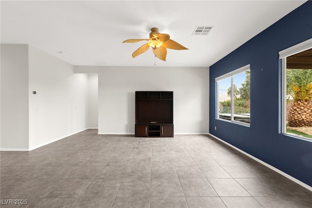 3528 Tack St, Las Vegas, NV 89122 - unfurnished living room featuring visible vents, ceiling fan, tile patterned flooring, and baseboards