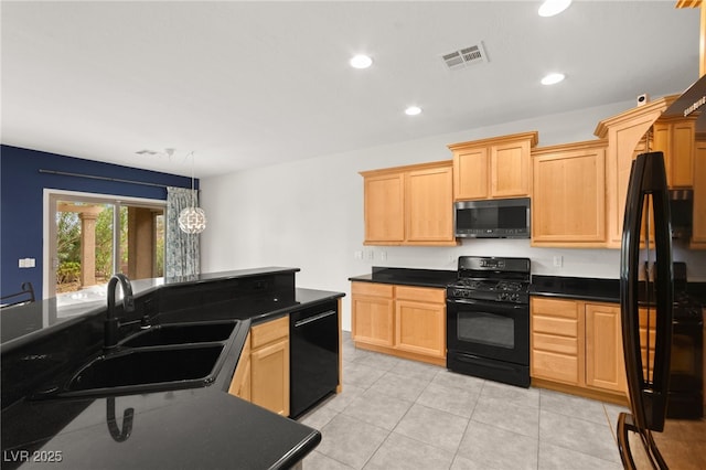 3528 Tack St, Las Vegas, NV 89122 - kitchen featuring black appliances, dark countertops, a sink, light brown cabinetry, and recessed lighting