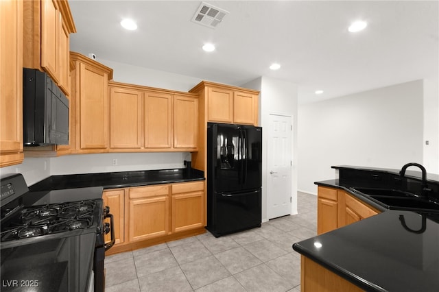 3528 Tack St, Las Vegas, NV 89122 - kitchen featuring black appliances, a sink, dark countertops, light tile patterned floors, and recessed lighting