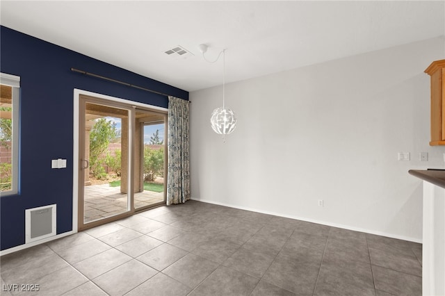 3528 Tack St, Las Vegas, NV 89122 - unfurnished dining area with tile patterned floors, an inviting chandelier, baseboards, and visible vents