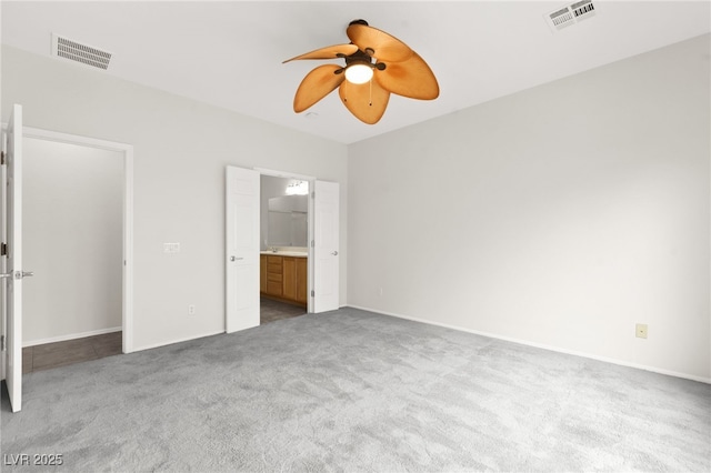 3528 Tack St, Las Vegas, NV 89122 - unfurnished bedroom featuring carpet floors, ensuite bath, ceiling fan, and baseboards
