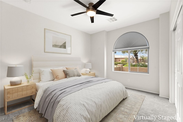 3528 Tack St, Las Vegas, NV 89122 - bedroom featuring light colored carpet, baseboards, and a ceiling fan