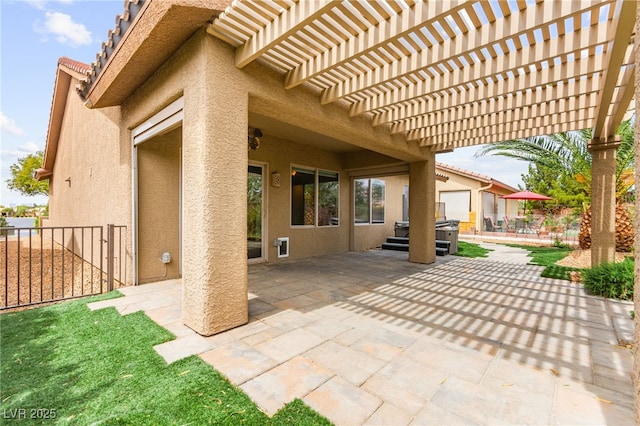 3528 Tack St, Las Vegas, NV 89122 - view of patio featuring a pergola and fence