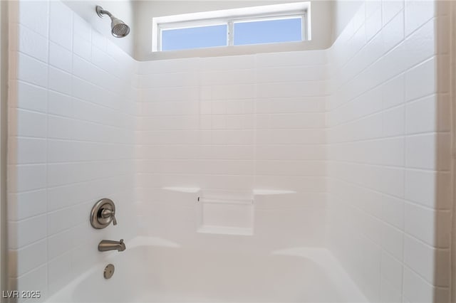 full bath featuring shower / tub combination