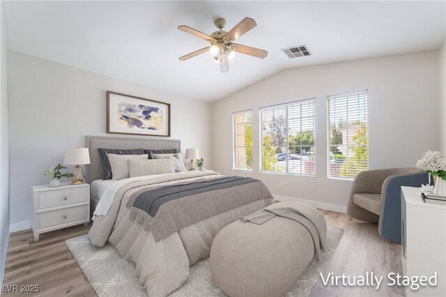 844 Binbrook Dr, Henderson, NV 89052 - bedroom with lofted ceiling, baseboards, light wood finished floors, and a ceiling fan