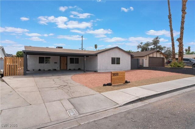 1808 E Saint Louis Ave, Las Vegas, NV 89104 - ranch-style house with asphalt driveway and stucco siding