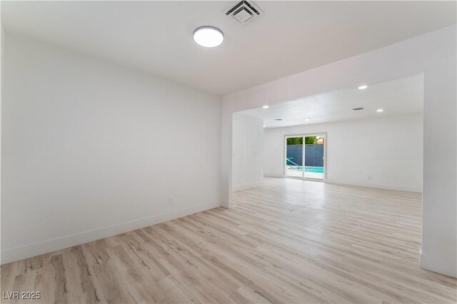 1808 E Saint Louis Ave, Las Vegas, NV 89104 - empty room featuring light wood-style floors, recessed lighting, and baseboards