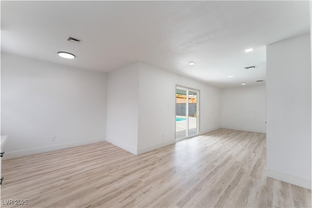 1808 E Saint Louis Ave, Las Vegas, NV 89104 - empty room with light wood-type flooring, baseboards, and recessed lighting