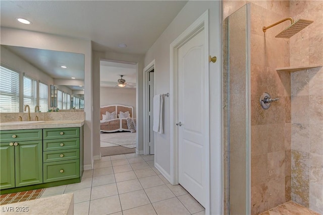 9992 Sky Parlor Rd, Las Vegas, NV 89178 - bathroom featuring a tile shower, tile patterned floors, vanity, and connected bathroom