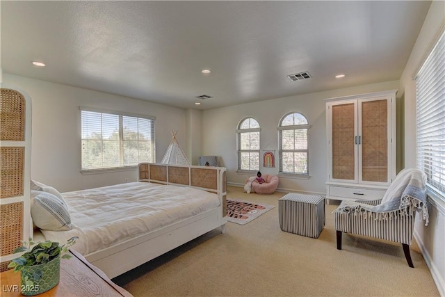 9992 Sky Parlor Rd, Las Vegas, NV 89178 - carpeted bedroom with multiple windows and visible vents