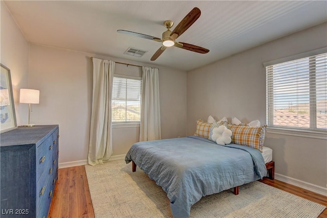9992 Sky Parlor Rd, Las Vegas, NV 89178 - bedroom featuring light wood-style flooring, baseboards, and visible vents
