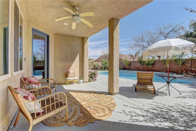 9992 Sky Parlor Rd, Las Vegas, NV 89178 - view of patio with a fenced in pool, a fenced backyard, and ceiling fan