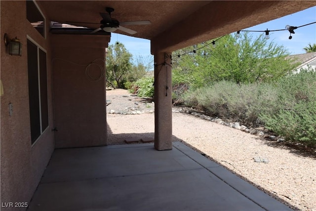 view of patio featuring ceiling fan